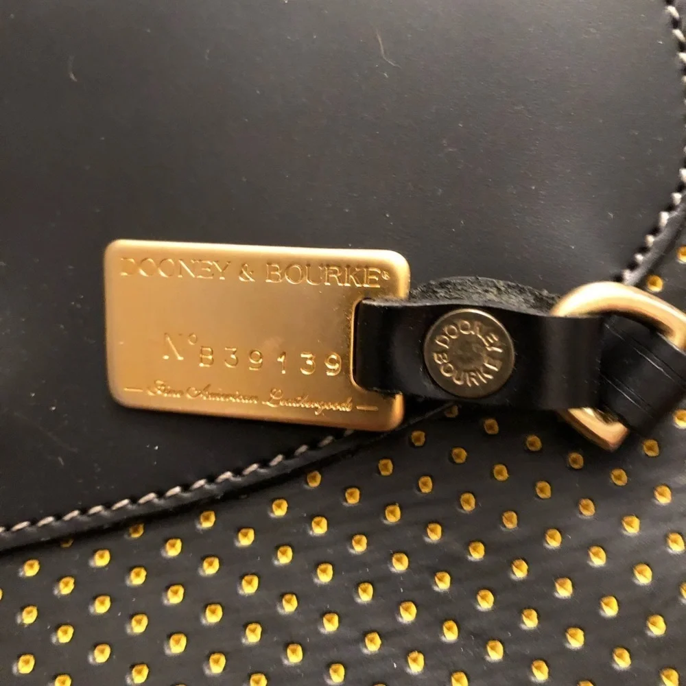 Dooney & Bourke Cabrio black leather laser cut w/ tag & serial number, vintage